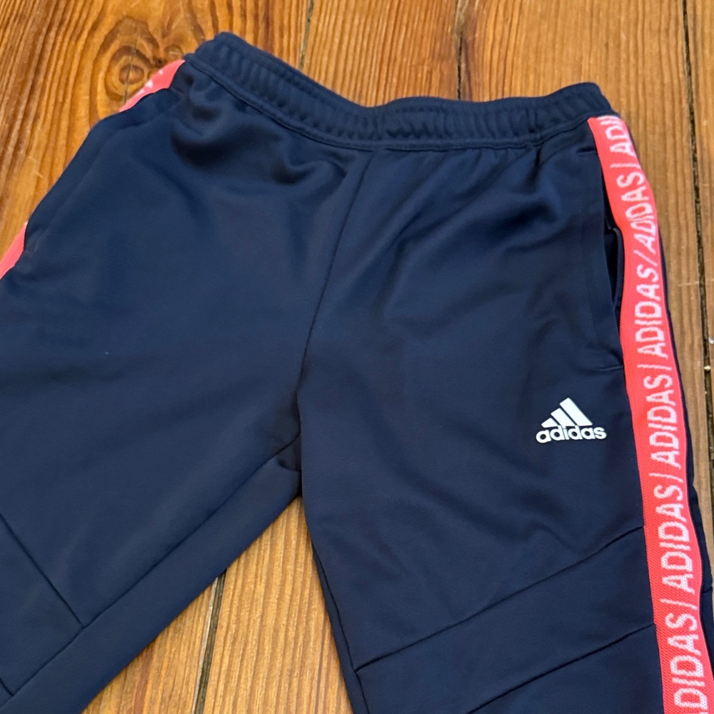 Size 11/12 Adidas Kids Navy Joggers with orange Stripes